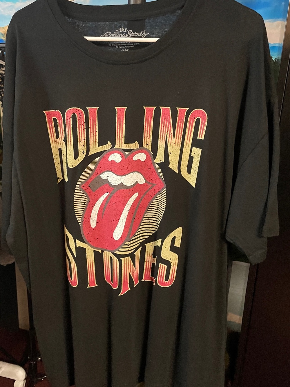 the Rolling Stones Black Tee with Red Tongue and Gold Lettering
